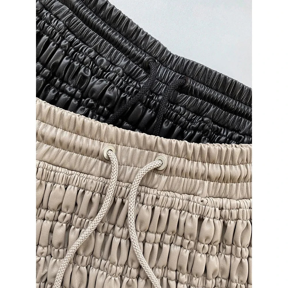 Women's Black Stretchy Faux Leather Midi Smocked Skirt - Frimunt Clothing Co.