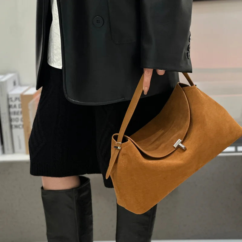 Bolso de mano T Lock para mujer de piel de ante natural