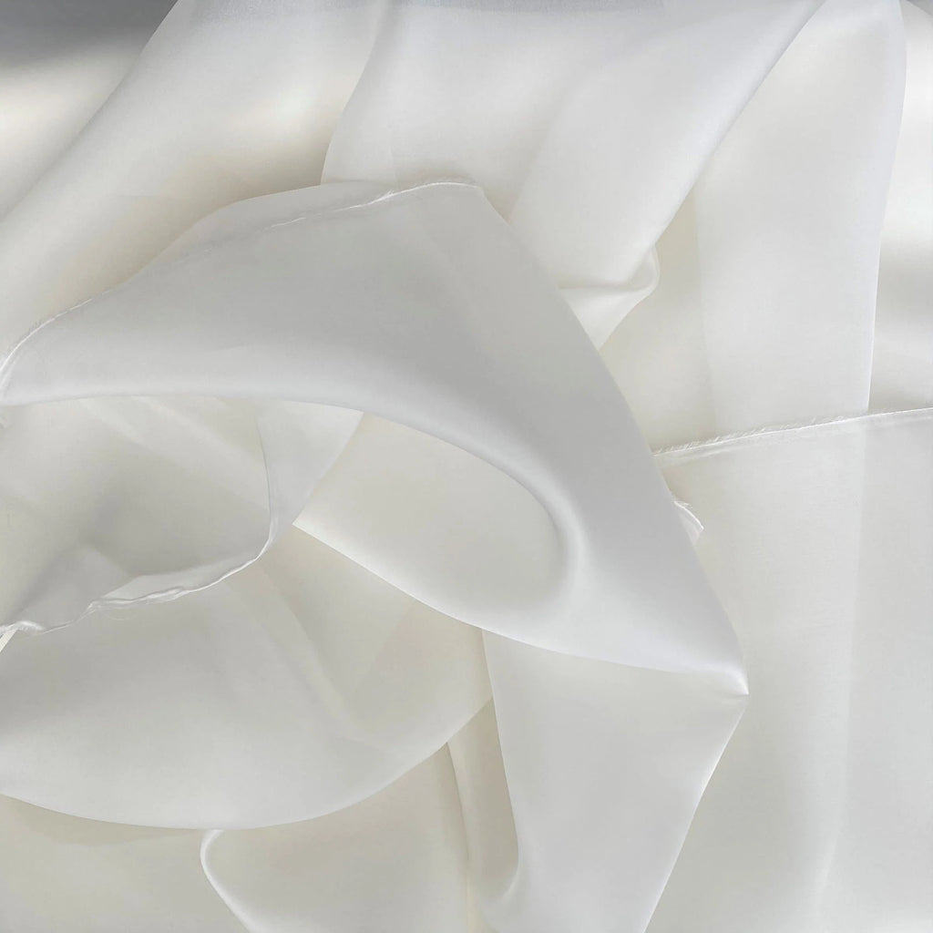 Close-up of white fabric with ruffled texture