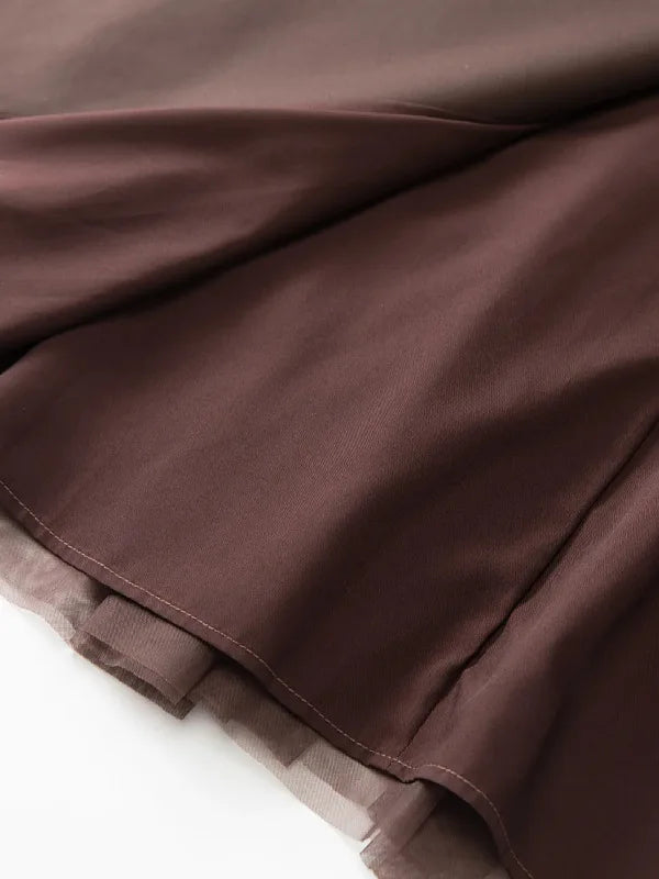 Gabardina cruzada con pliegues y cinturón de malla estampada retro francesa