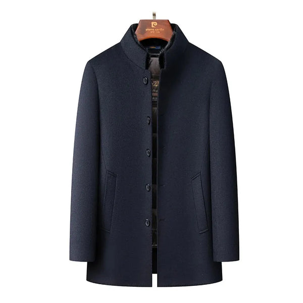 Black wool coat for men mock neck hanging on a hanger close up view with a white background