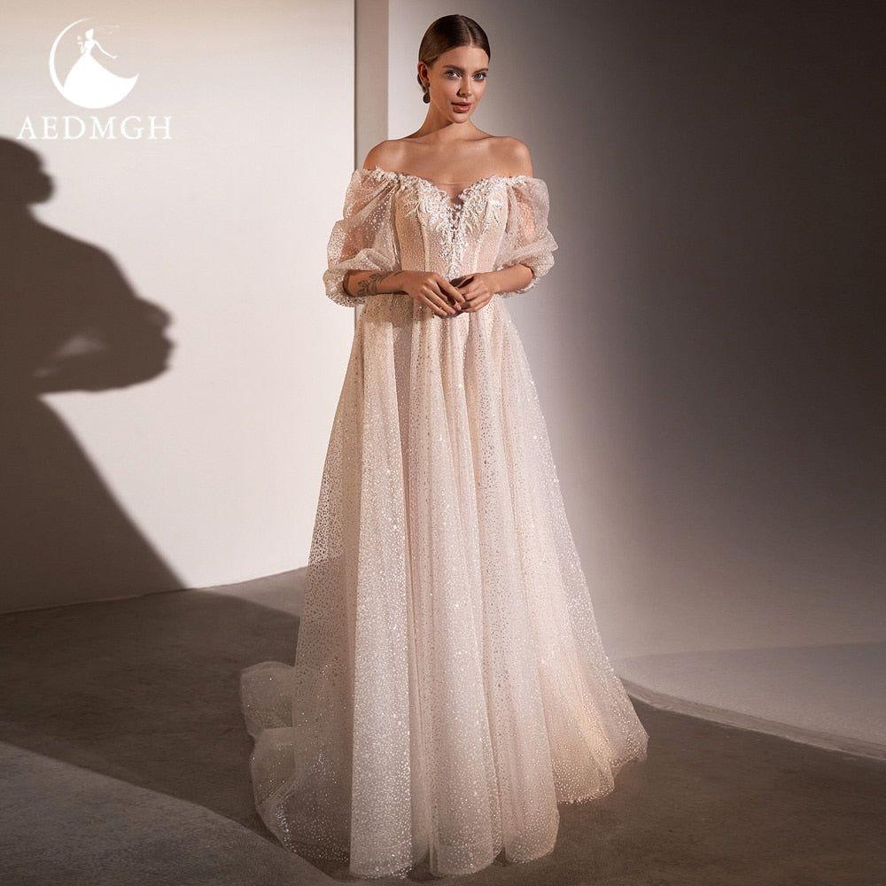 Sherlyn A-Line Beach Wedding Dress 2022 Strapless Off The Shoulder Half Sleeve Beaded Lace Shiny Beading - Frimunt Clothing Co.